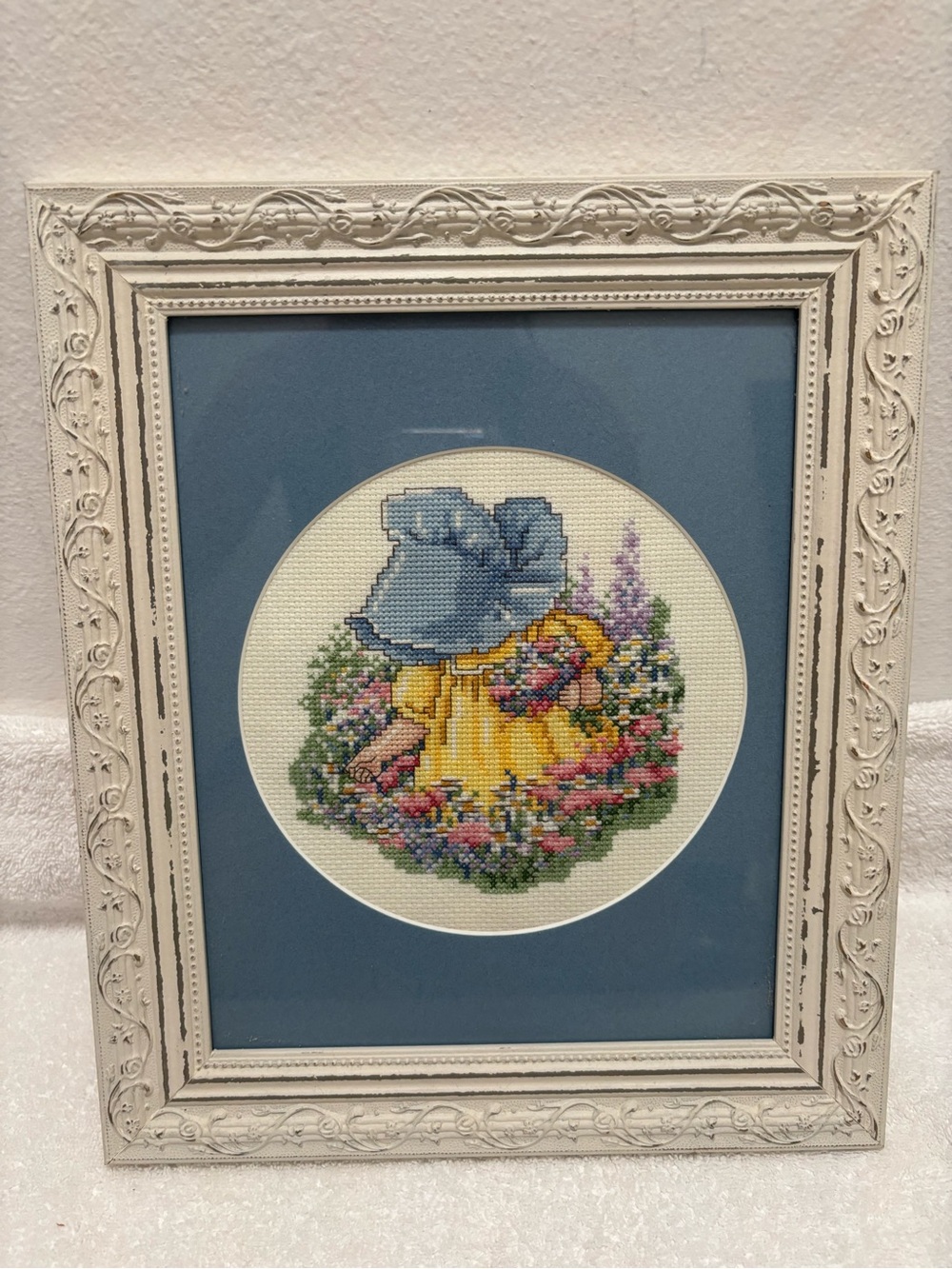 Framed Cross-Stitch Girl in Garden Wall Art - Blue and Yellow